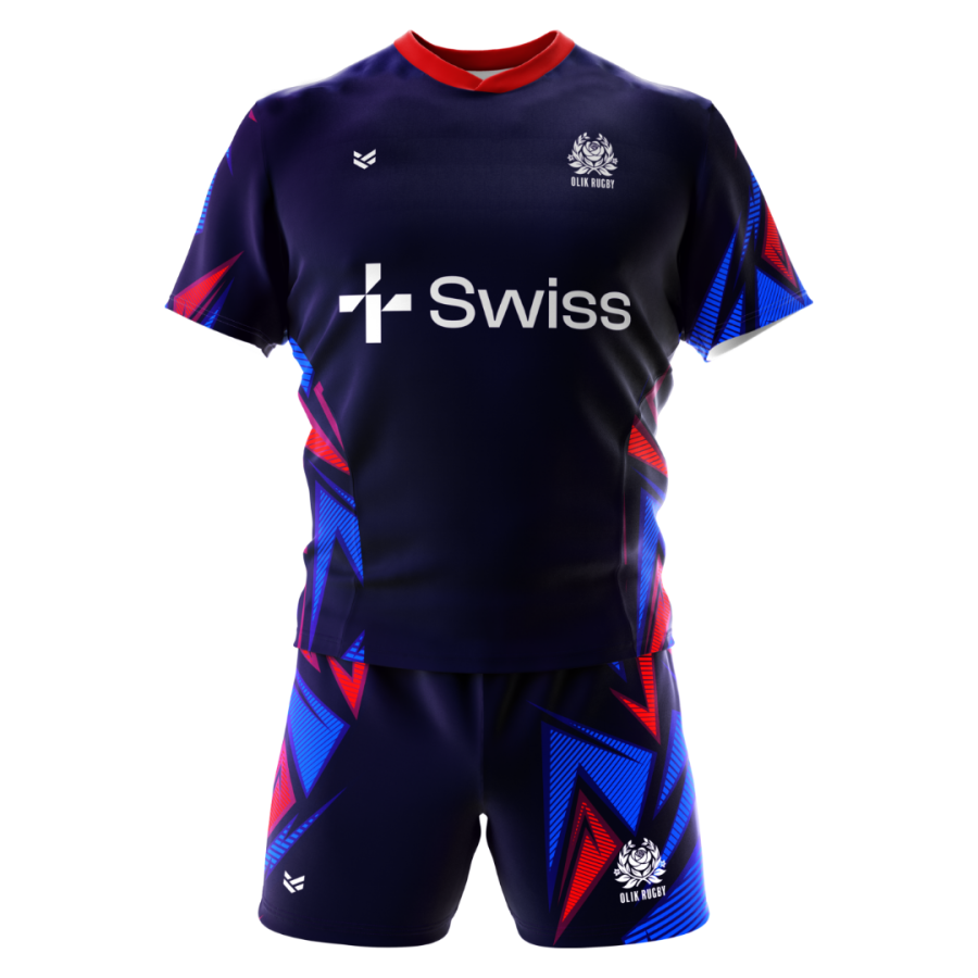 Navy customisable rugby shirts and shorts featuring bold red and electric blue geometric side panels, red collar, Swiss sponsor logo, OLIK Rugby crest and matching patterned shorts. Bespoke rugby kit with personalised colours, logos and sponsor branding.