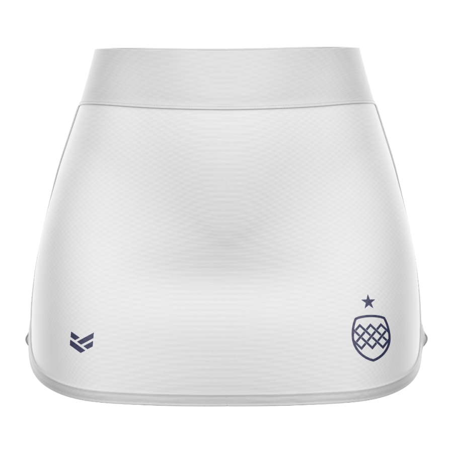 Customisable sports skort combining fitted shorts and an outer skirt for comfort and mobility.