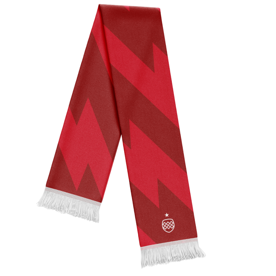 Custom knitted scarf featuring a bold red and burgundy chevron pattern with white tassels and a white woven club crest with a single star near one end. Personalised supporter scarf for sports clubs, teams and organisations.