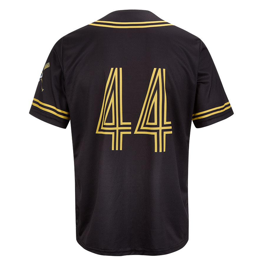 The back of a custom printed baseball shirt. The jersey is black with gold trim and the number 44 also printed in gold.